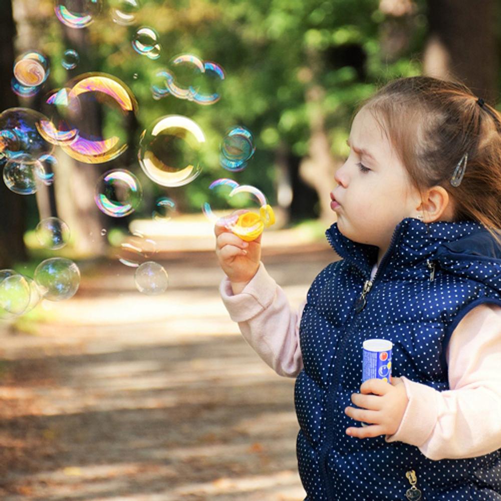 Kid Blowing Bubbles